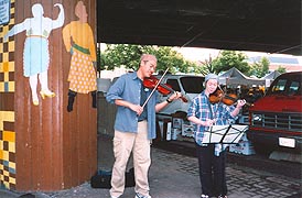 [photo, Street musicians near Baltimore Farmers' Market, Guilford Ave., Baltimore, Maryland]